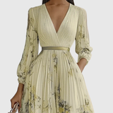 Rowella | Elegant maxikjole med plisseringer