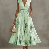 Rowella | Elegant maxikjole med plisseringer